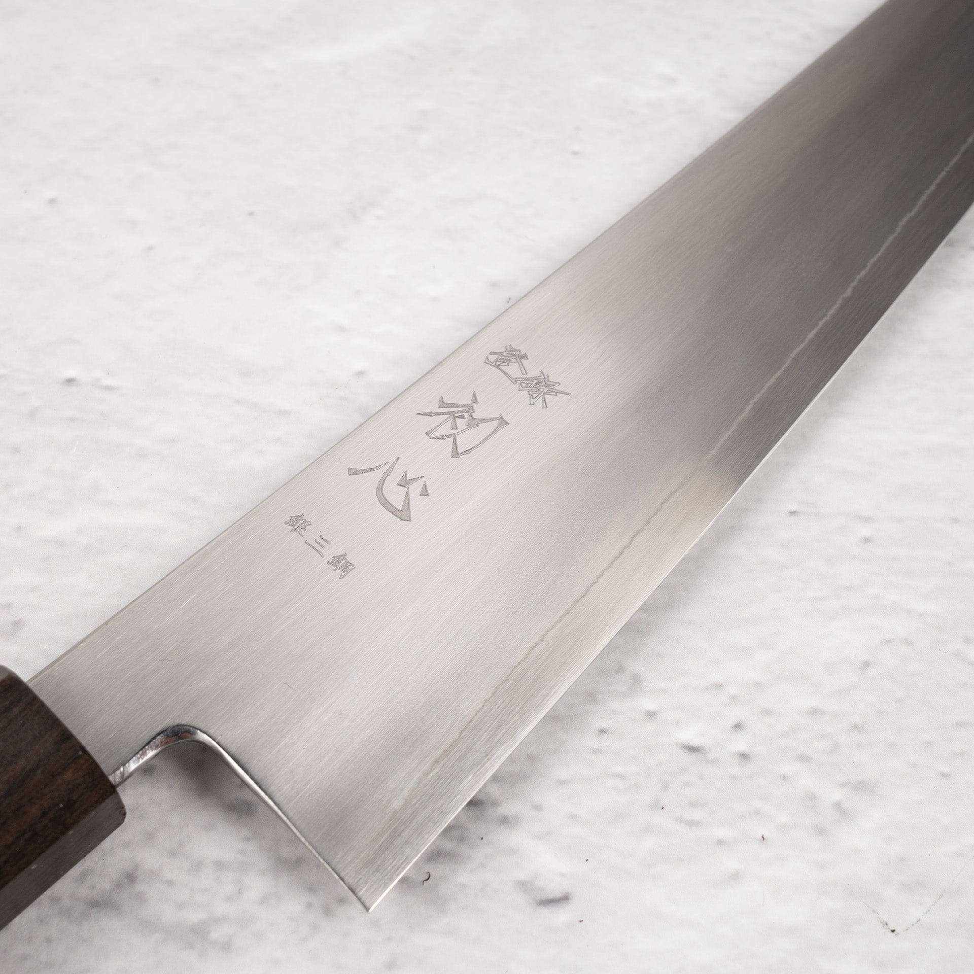 HatsukokoroGinsoGinsanKtipGyuto210mmc.jpg Hatsukokoro Ginso Ginsan K tip Gyuto 210mm, view 3