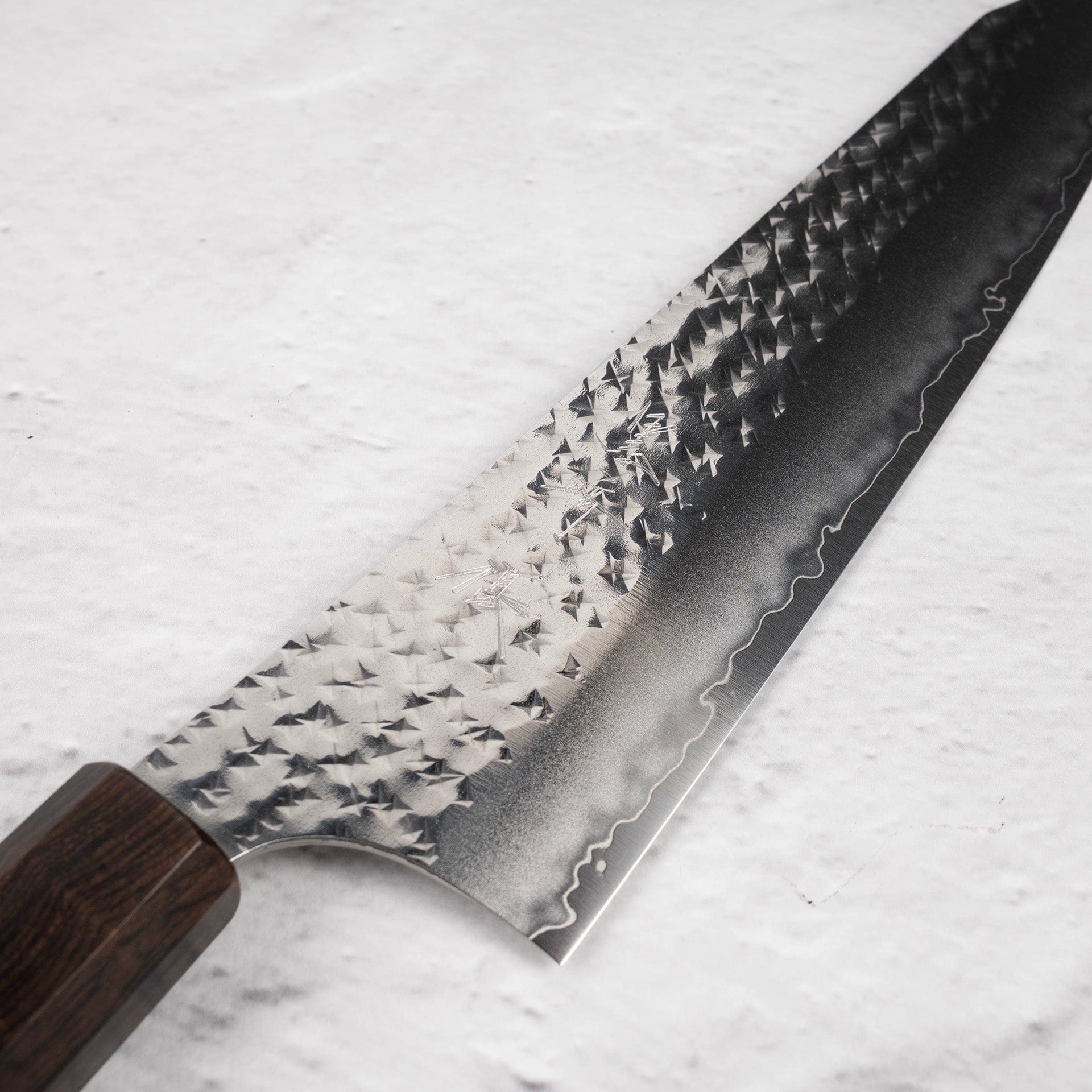 KurosakiSenkoEiSG2K-tipGyuto210mmEbonyHandleb.jpg Kurosaki Senko Ei SG2 K-tip Gyuto 210mm Ebony, view 2
