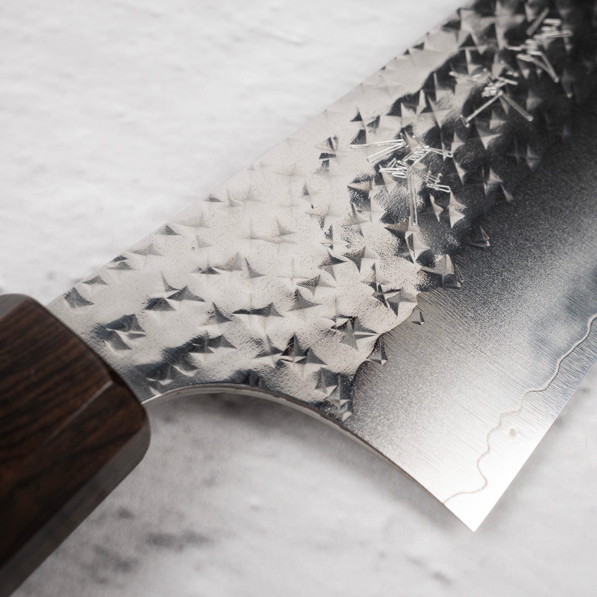KurosakiSenkoEiSG2K-tipGyuto210mmEbonyHandlec.jpg Kurosaki Senko Ei SG2 K-tip Gyuto 210mm Ebony, view 3