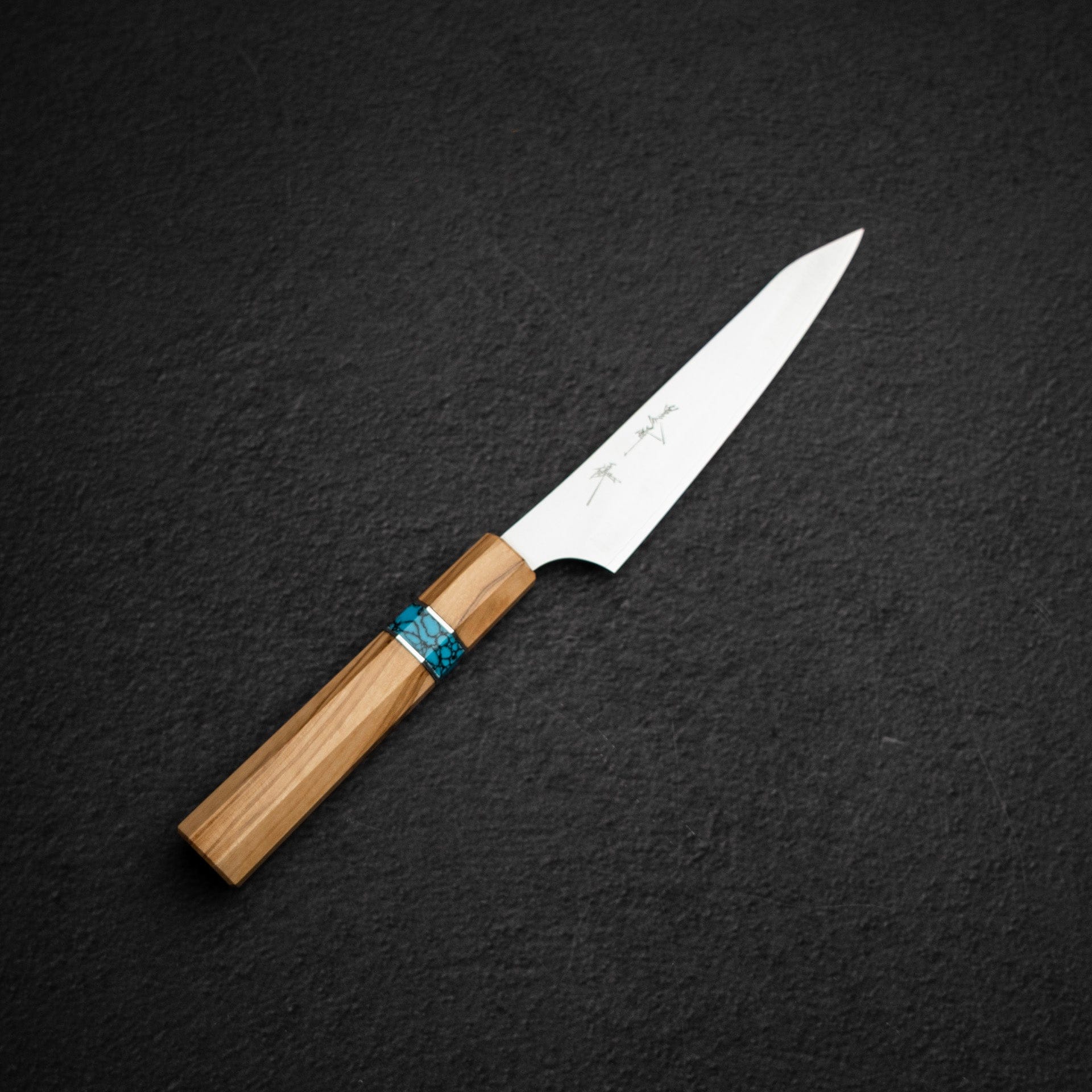 KurosakiVGXEOSGekkoPetty130mm-TurquoiseRingb_dc0686a5-1e92-4664-9235-7fbc8d846697.jpg Kurosaki VG XEOS Gekko Petty 130mm - Turquoise Ring, view 2