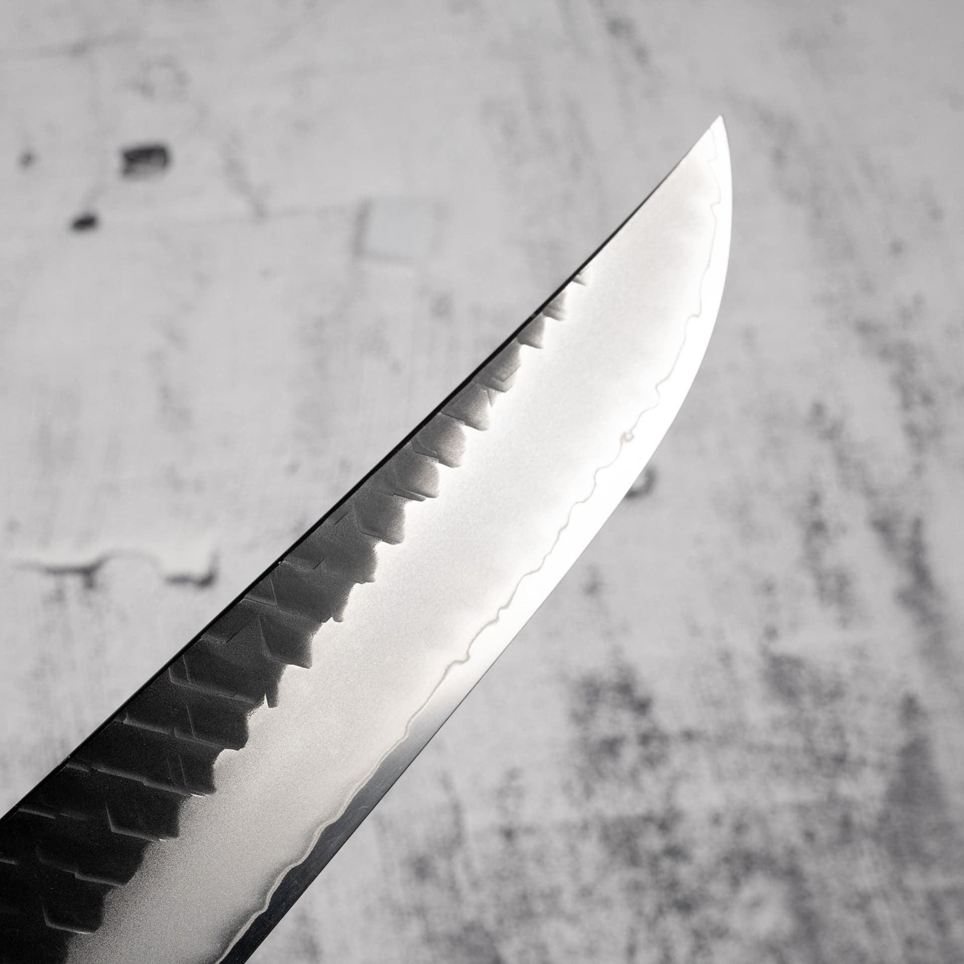 NigaraSG2KUButcherKnife150mm-20250814-08.jpg Nigara SG2 KU Butcher 165mm Kurouchi Tsuchme Ebony, view 3