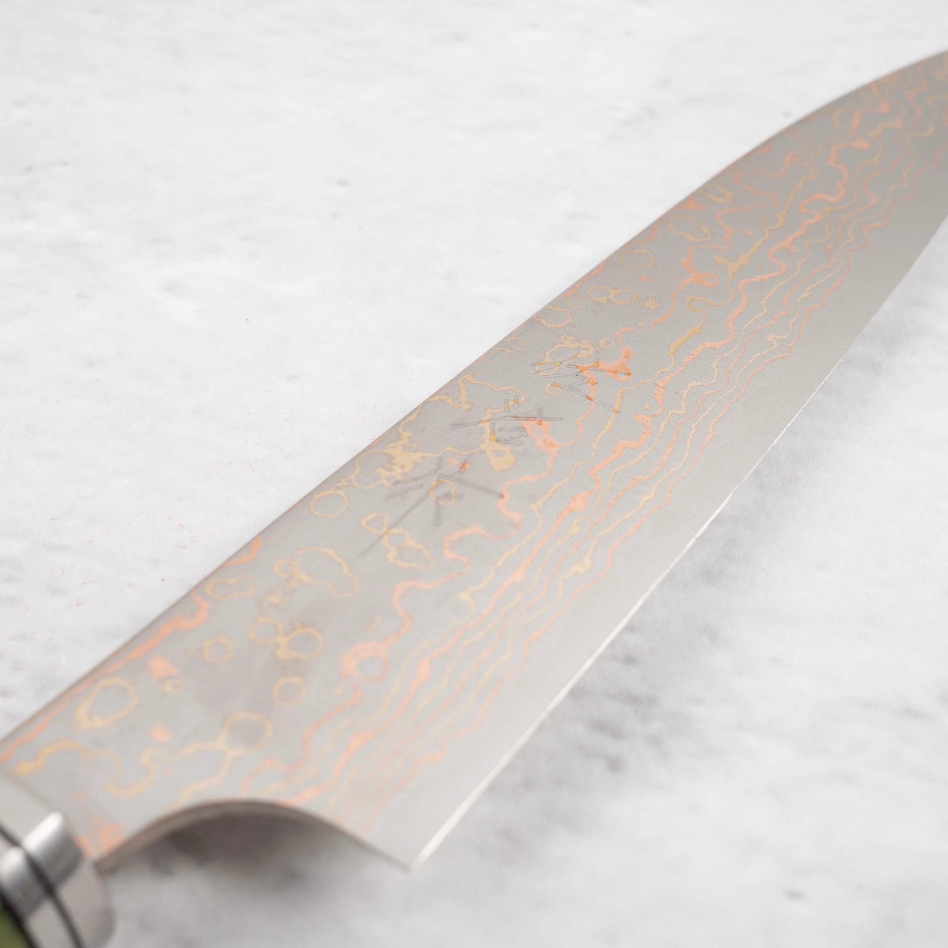 SajiVG10RainbowDamascusPetty135mmCosmoSwirlHandlec.jpg EOFY2025 SPECIAL: Saji VG10 Rainbow Damascus Petty 130mm with Cosmic Swirl Handle, view 4