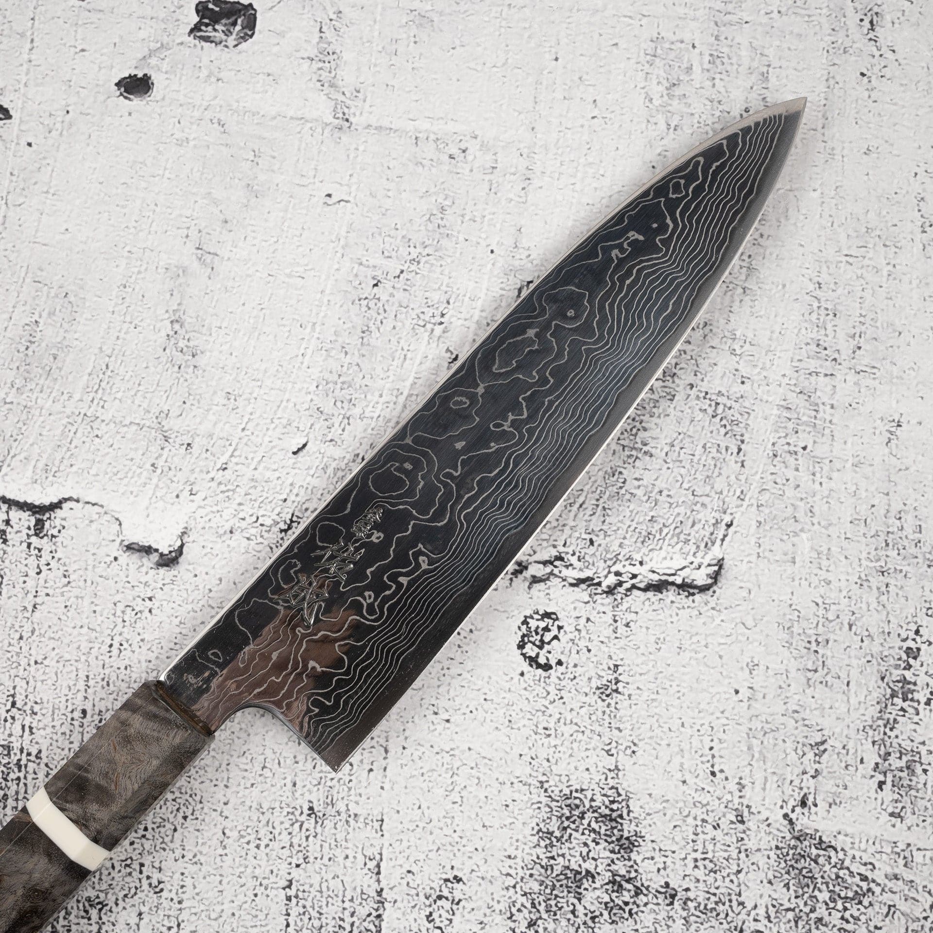 SukenariSG2DamascusGyuto210mmEbony-20250829-04_c71036db-0b77-40ec-a4d7-bb64f0a2588c.jpg Sukenari SG2 Damascus Gyuto 210mm Birch, view 2
