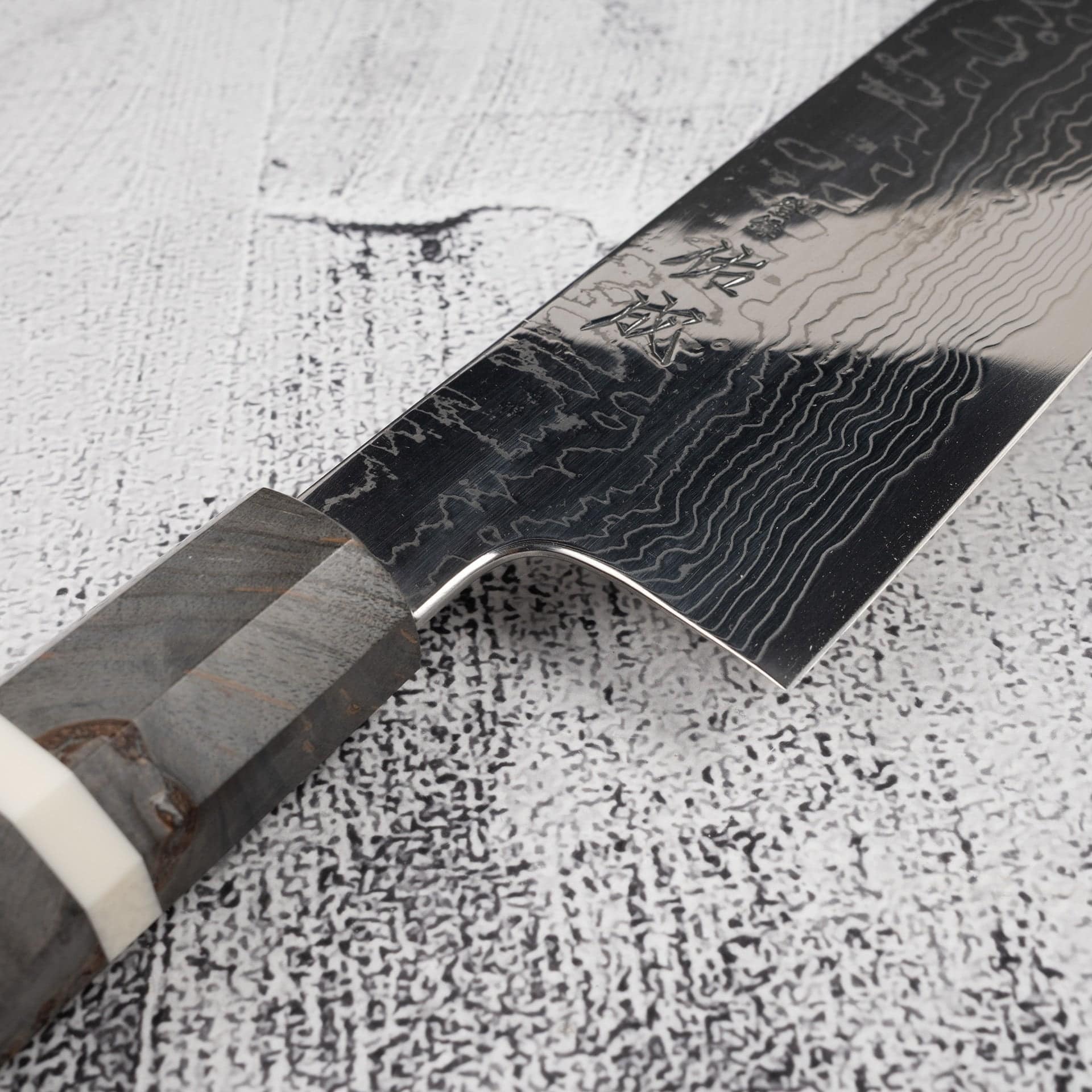 SukenariSG2K-tipGyuto270mmDamascusBirchHandle-20250829-06.jpg Sukenari SG2 Damascus K-tip Gyuto 270mm Birch, view 5
