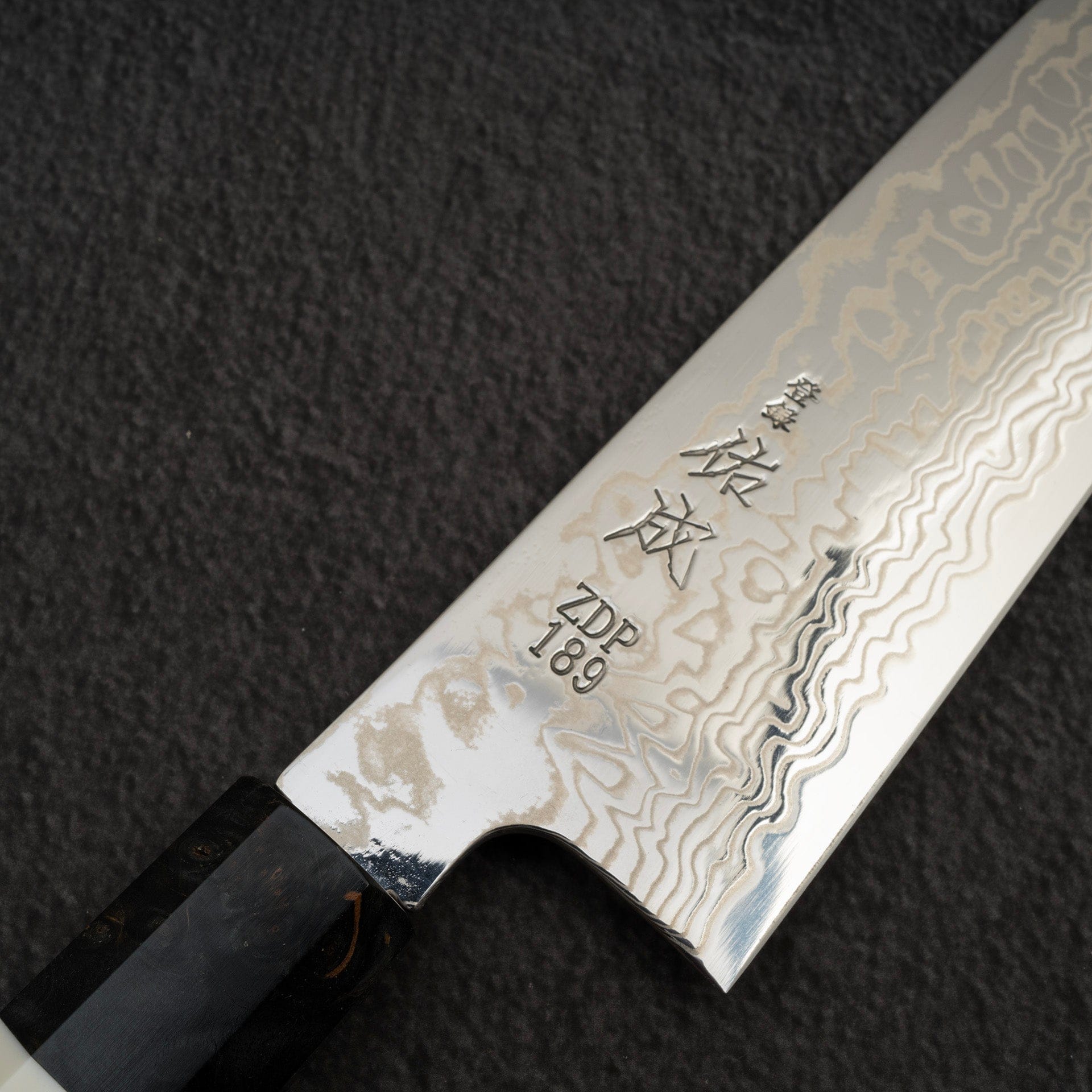 SukenariZDP-189DamascusGyuto240mmc.jpg Sukenari ZDP-189 Damascus Gyuto 240mm Birch Burl Handle, view 3