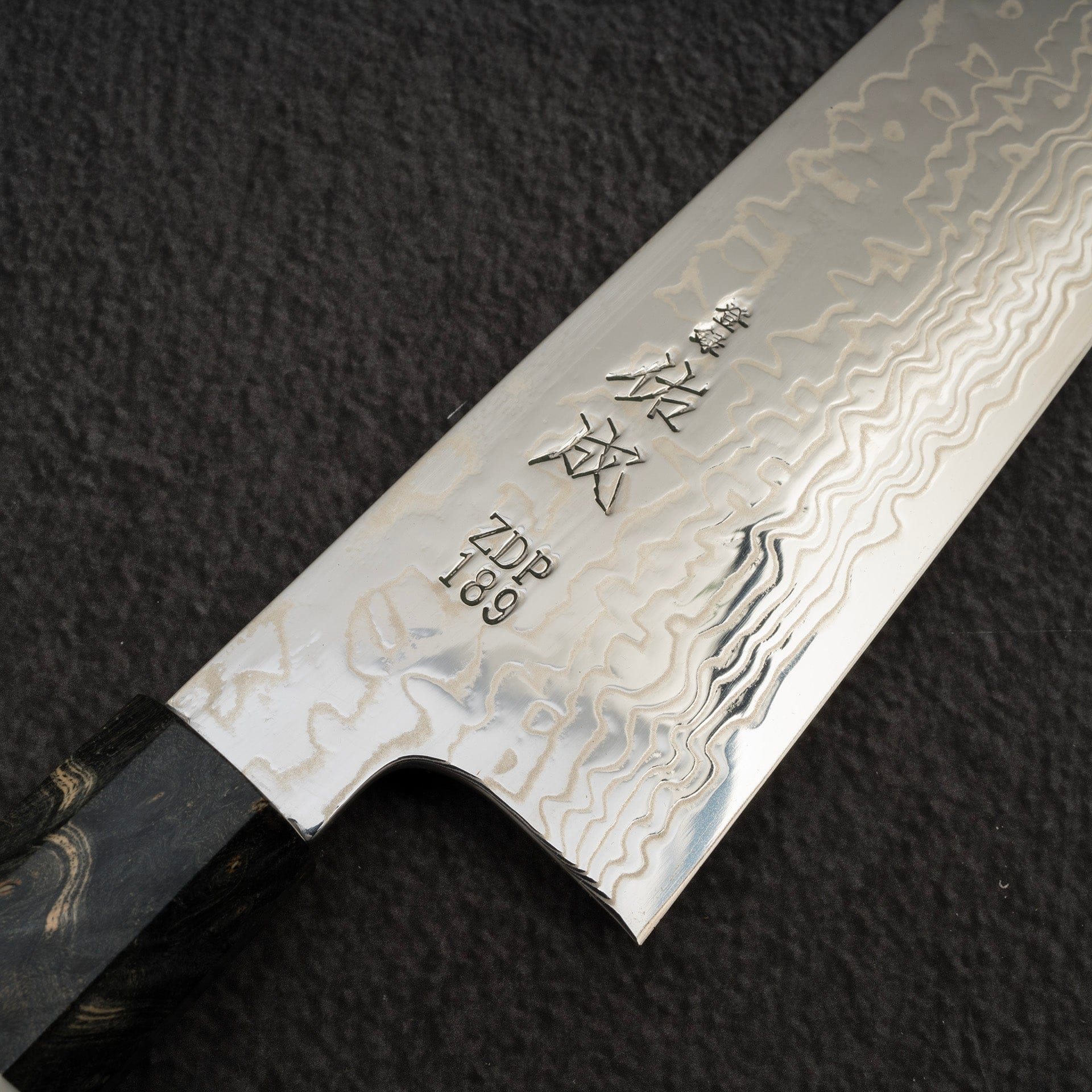 SukenariZDP-189DamascusGyuto270mmc.jpg Sukenari ZDP-189 Damascus Gyuto 270mm Birch Burl Handle, view 3