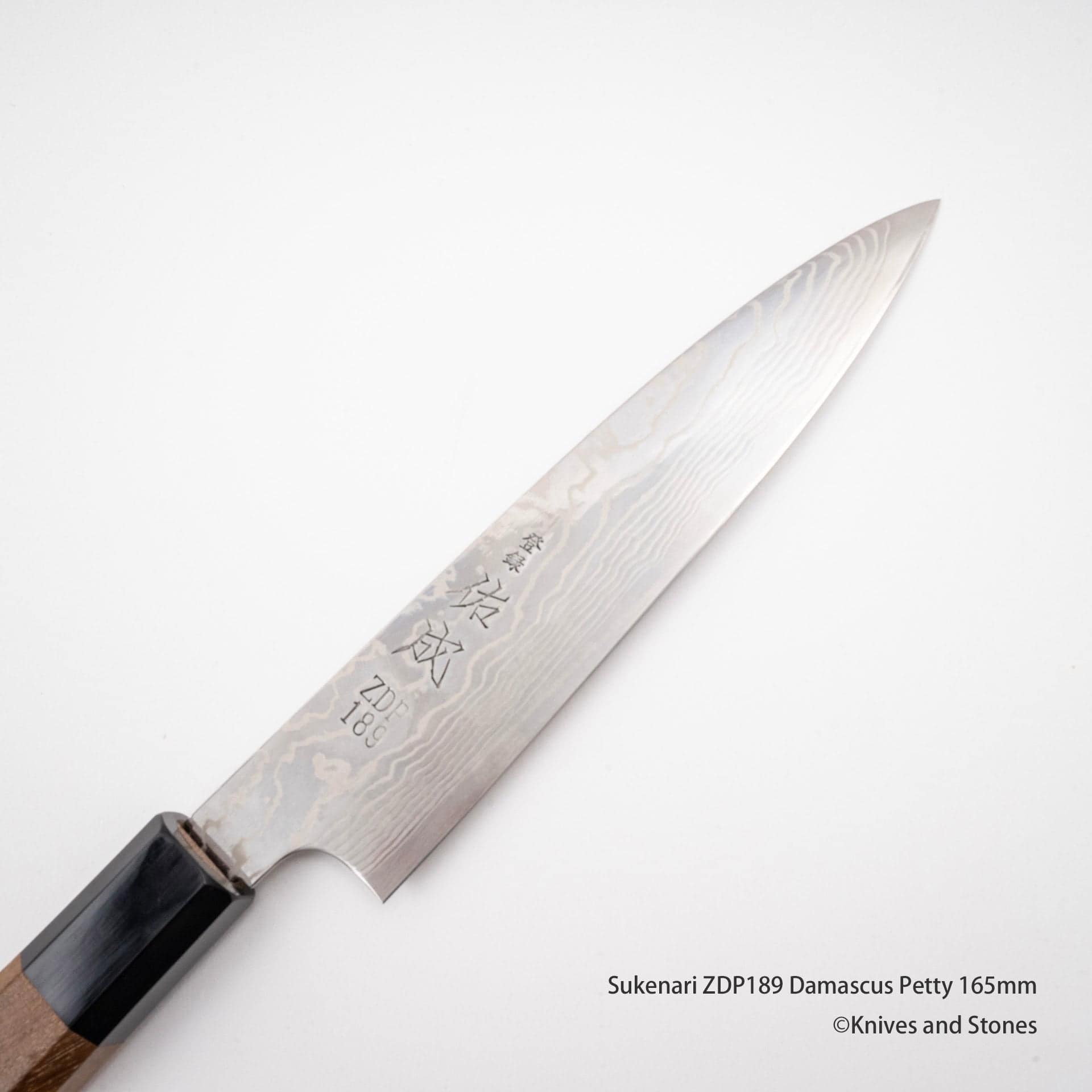 SukenariZDP189DamascusPetty165mmG.jpg Sukenari ZDP189 Damascus Petty 165mm, view 2