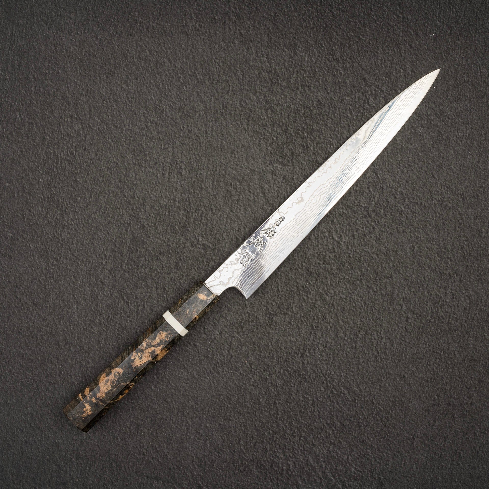 SukenariZDP189DamascusSujihiki240mmBurlHandlea.jpg Sukenari ZDP-189 Damascus Sujihiki 240mm Burl Handle with Saya, view 2