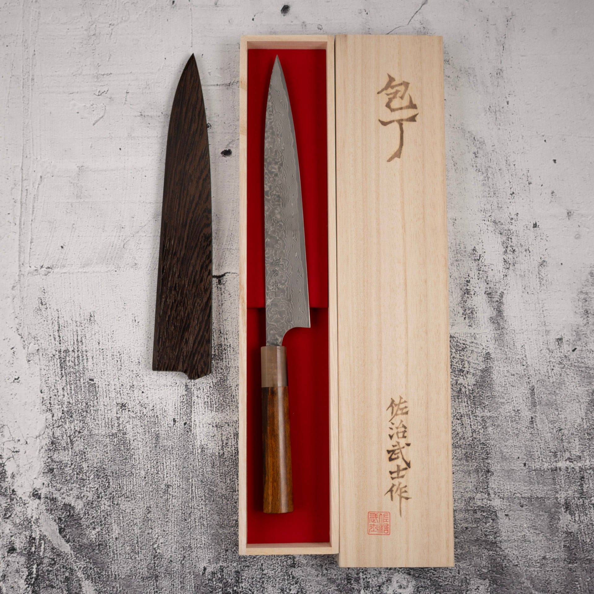 TakeshiSajiSG2BlackDamascusSujihiki240mmHeart-shapedIronwoodHandlek.jpg Takeshi Saji SG2 Black Damascus Sujihiki 240mm Heart-shaped Ironwood Handle, view 2