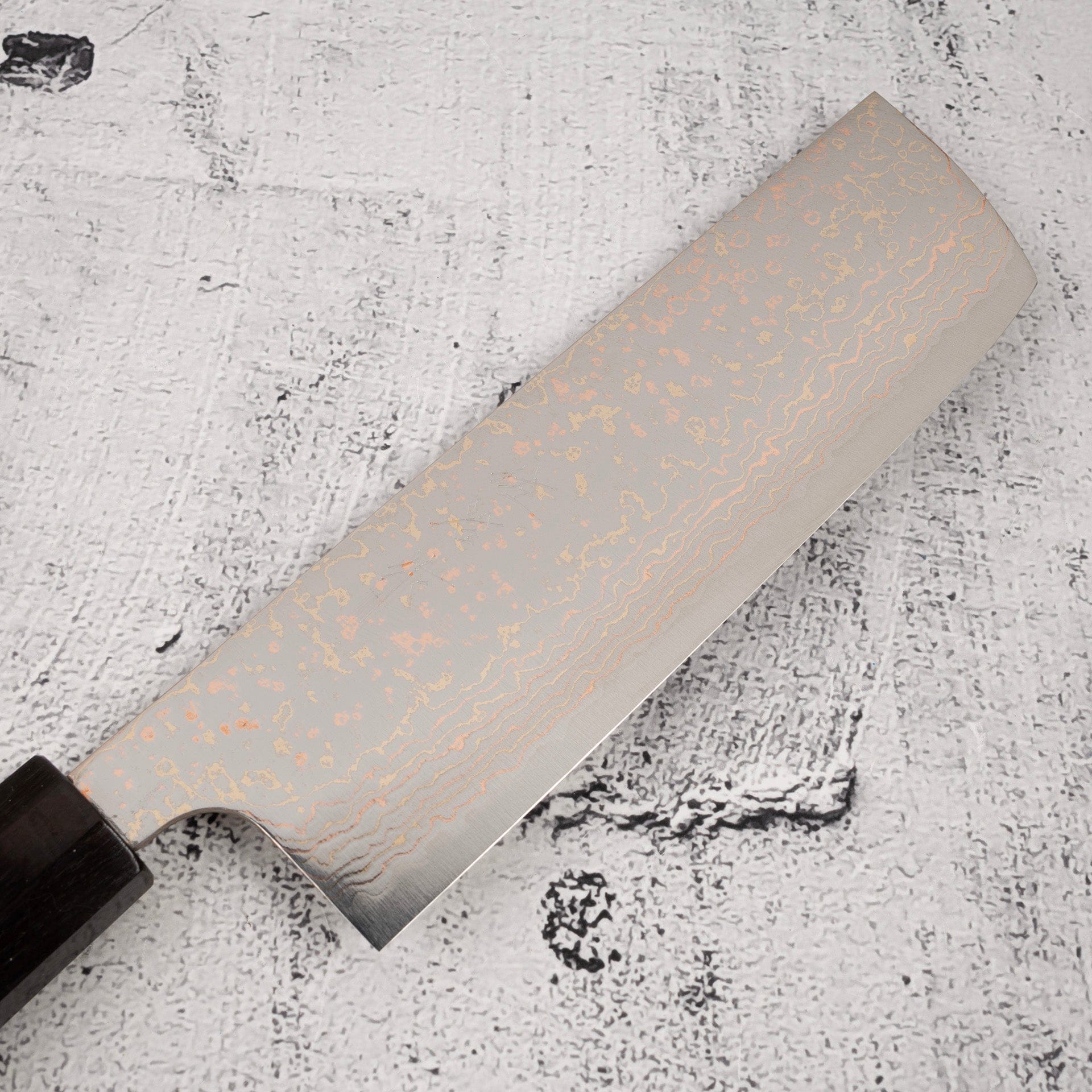 TakeshiSajiVG10RainbowDamascusNakiri165mmEbonyHandleMosaicPinc_8064f64a-ce08-4798-ade1-fe658c5038c5.jpg Takeshi Saji VG10 Rainbow Damascus Nakiri 165mm Ebony Handle Mosaic Pin, view 4