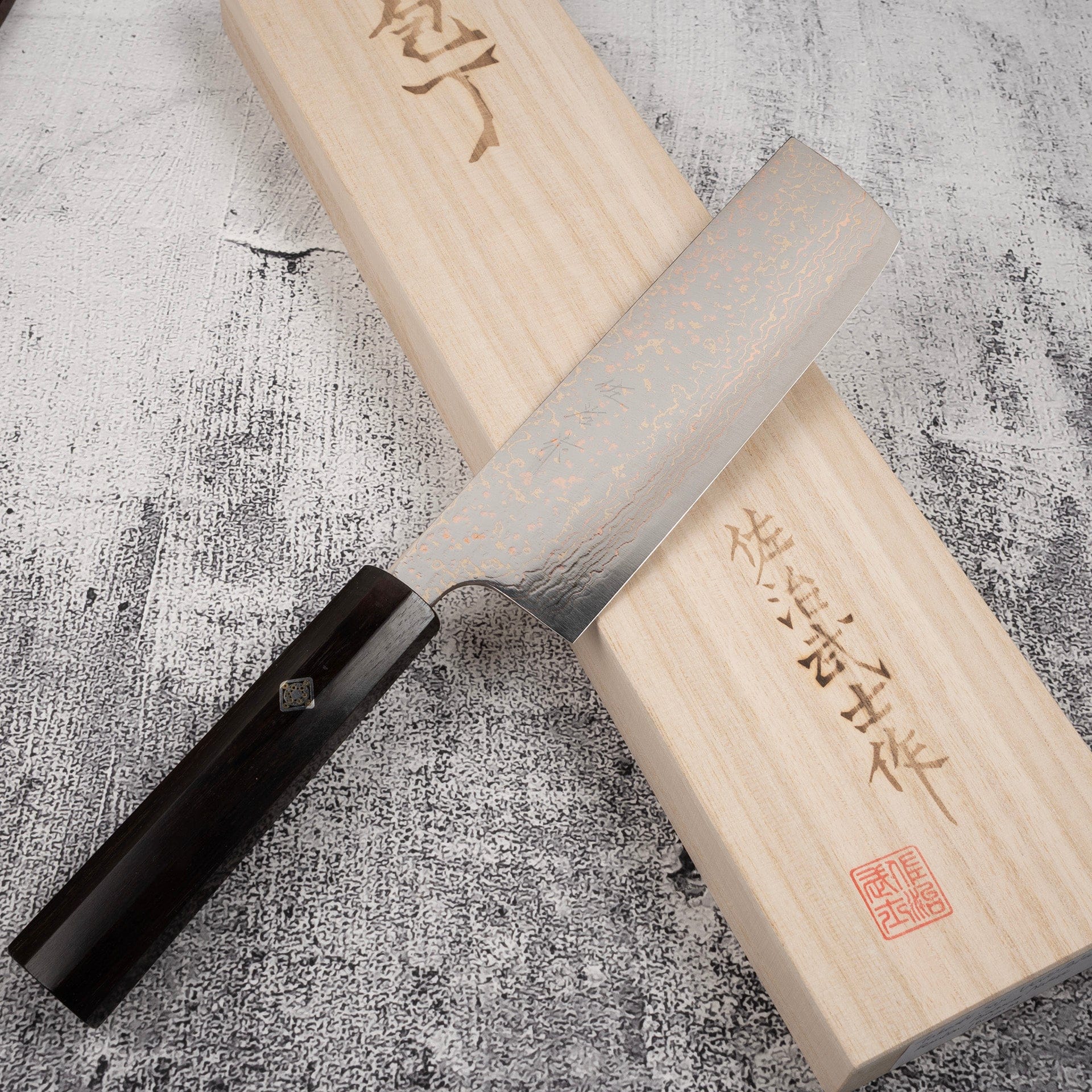 TakeshiSajiVG10RainbowDamascusNakiri165mmEbonyHandleMosaicPinj_3a49311a-e502-4fb4-a925-fbc064397263.jpg Takeshi Saji VG10 Rainbow Damascus Nakiri 165mm Ebony Handle Mosaic Pin, view 2
