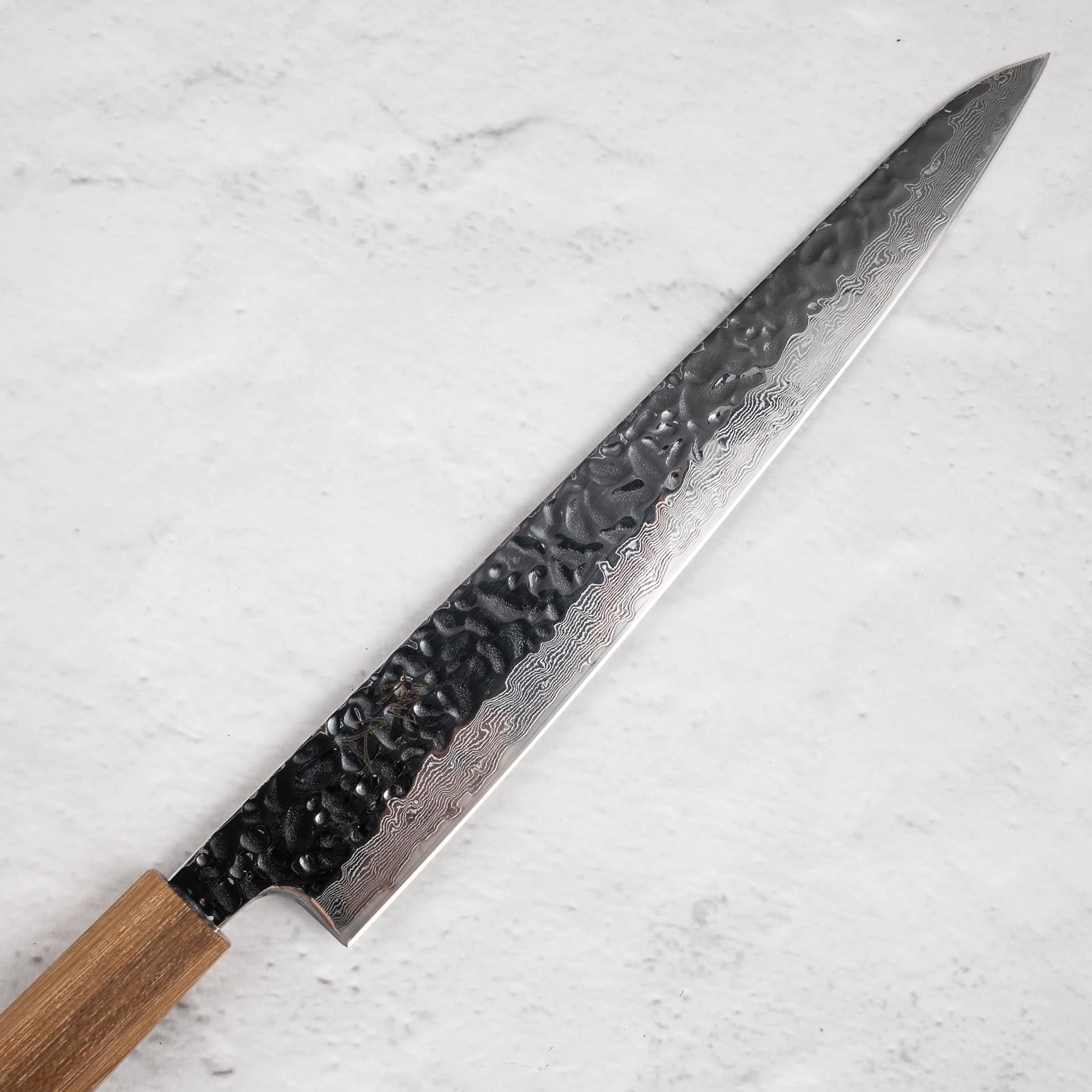 TsunehiraAUS10TsuchimeDamascusSujihiki240mmb.jpg Tsunehisa AUS10 Tsuchime Damascus Sujihiki 240 mm, view 2