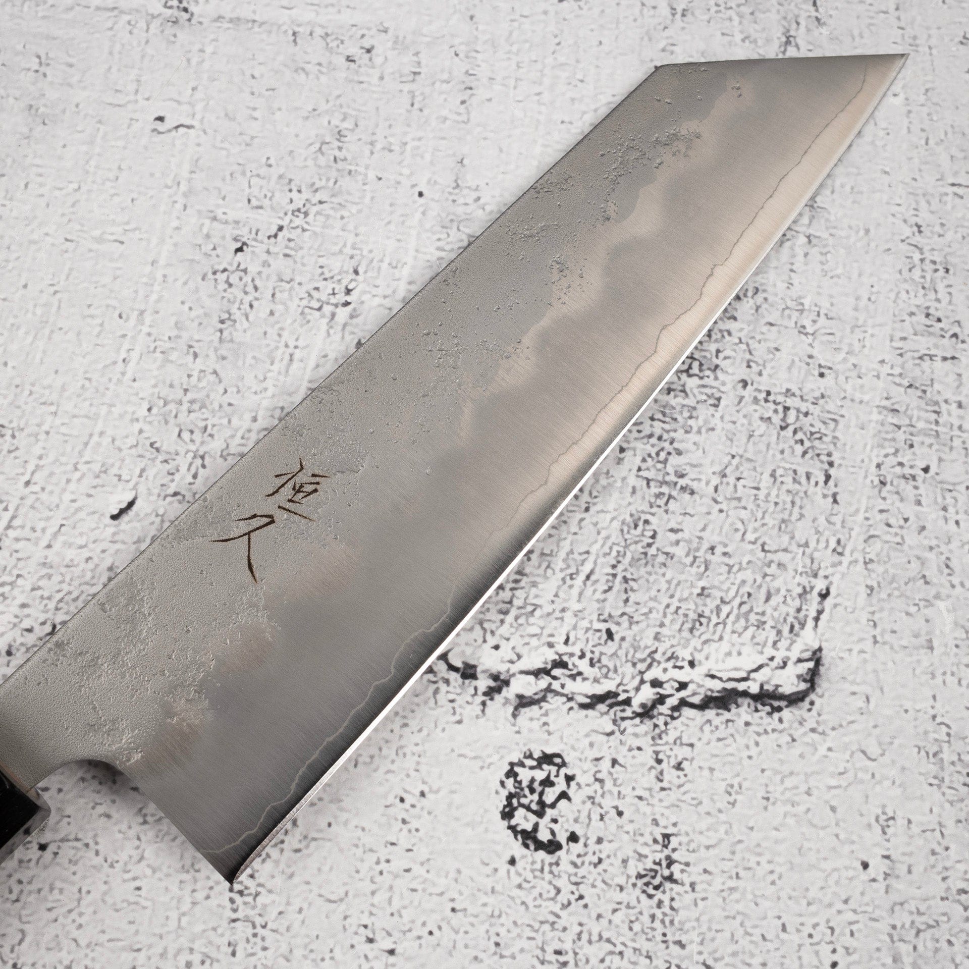 TsunehisaGinsanNashijiBunka180mmEbonyHandleb_411667ce-0f83-458f-b4f8-cb4e56e3b6b6.jpg Tsunehisa Ginsan Nashiji Bunka 180mm Ebony Handle, view 2
